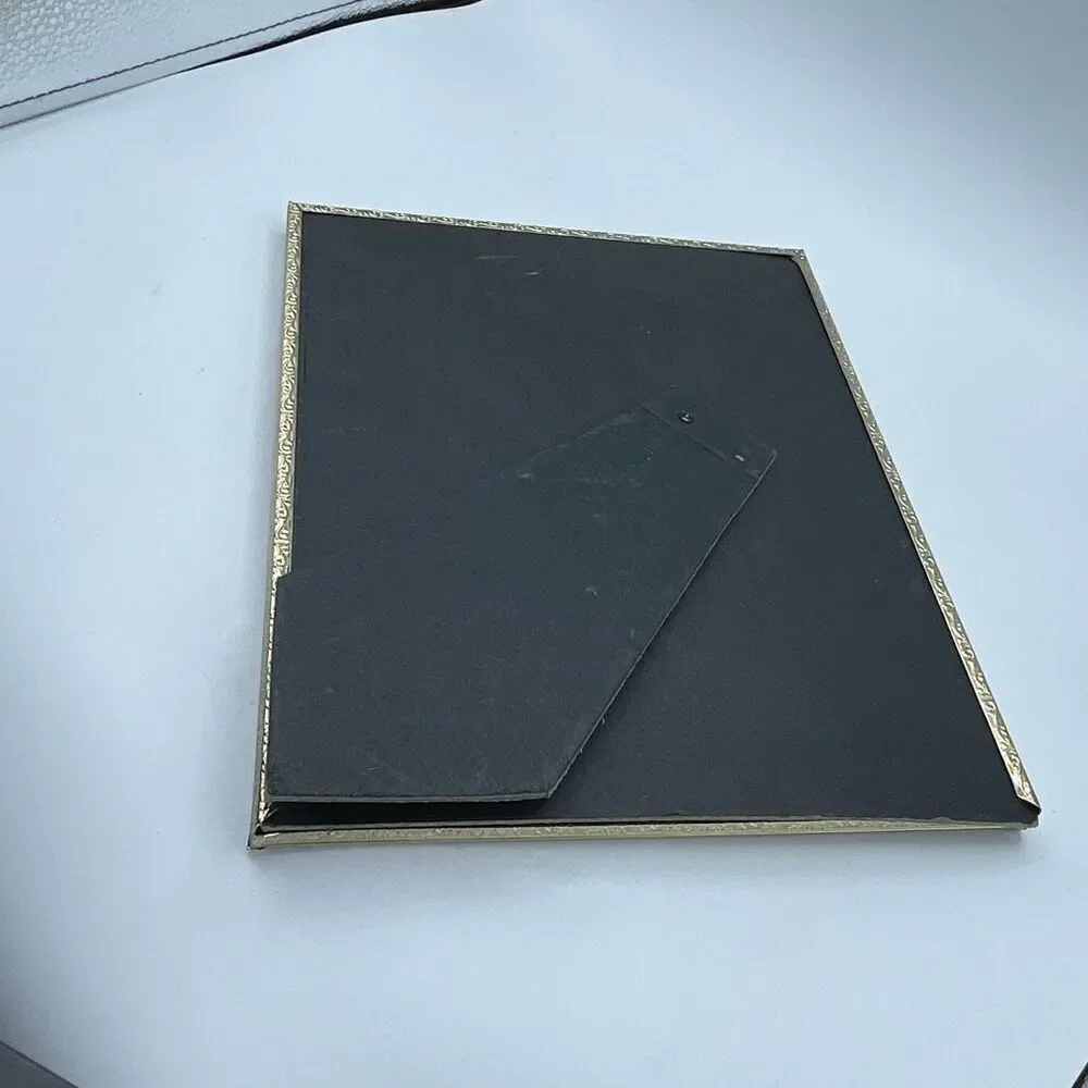 Vintage goldtone 8”X10” picture frame.